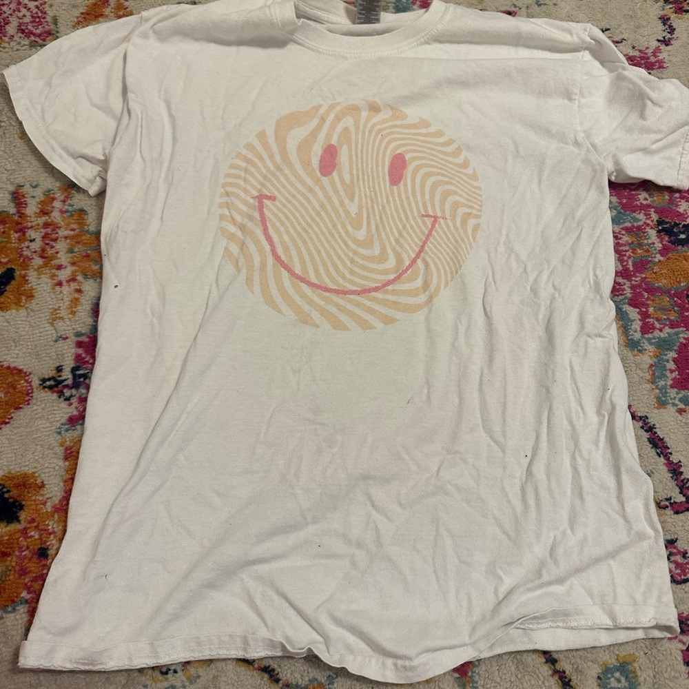 White smiley face shirt